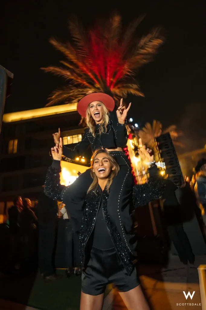 Rock the rooftop 2025 guests celebrating shoulder ride festival