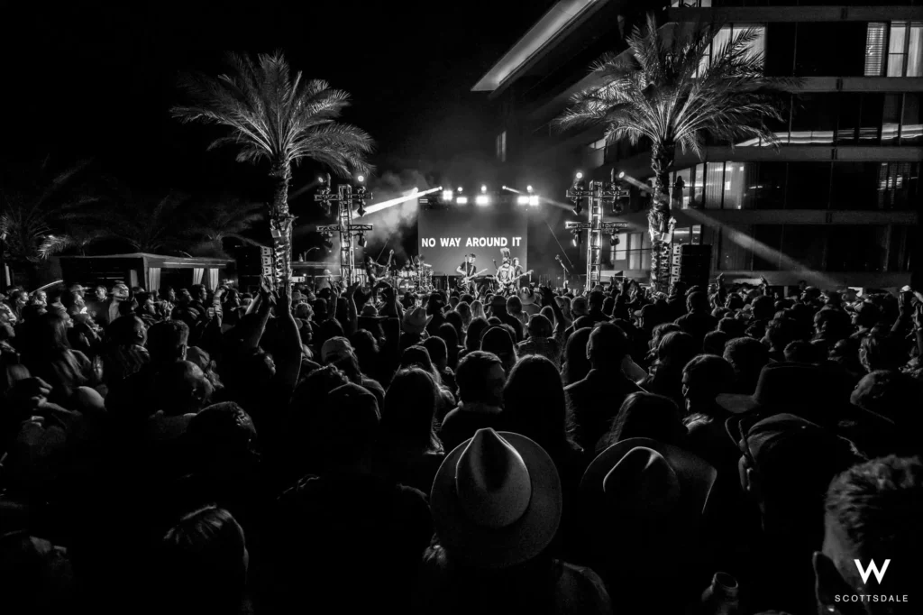 Rock the rooftop 2025 rooftop crowd palm trees night black and white