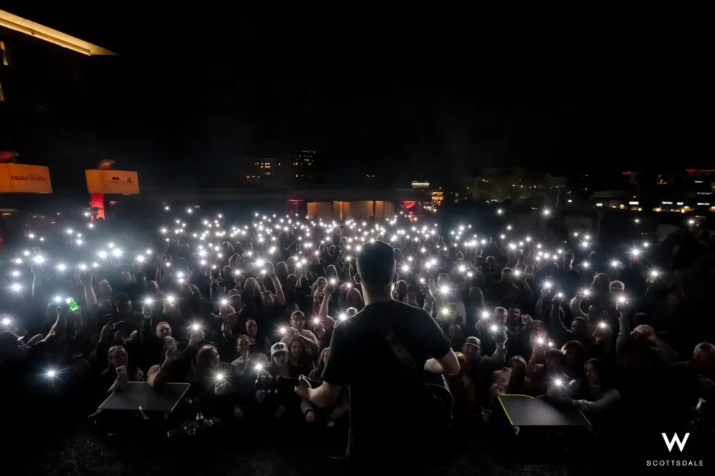 Rock the rooftop 2025 sea of phone lights rooftop crowd