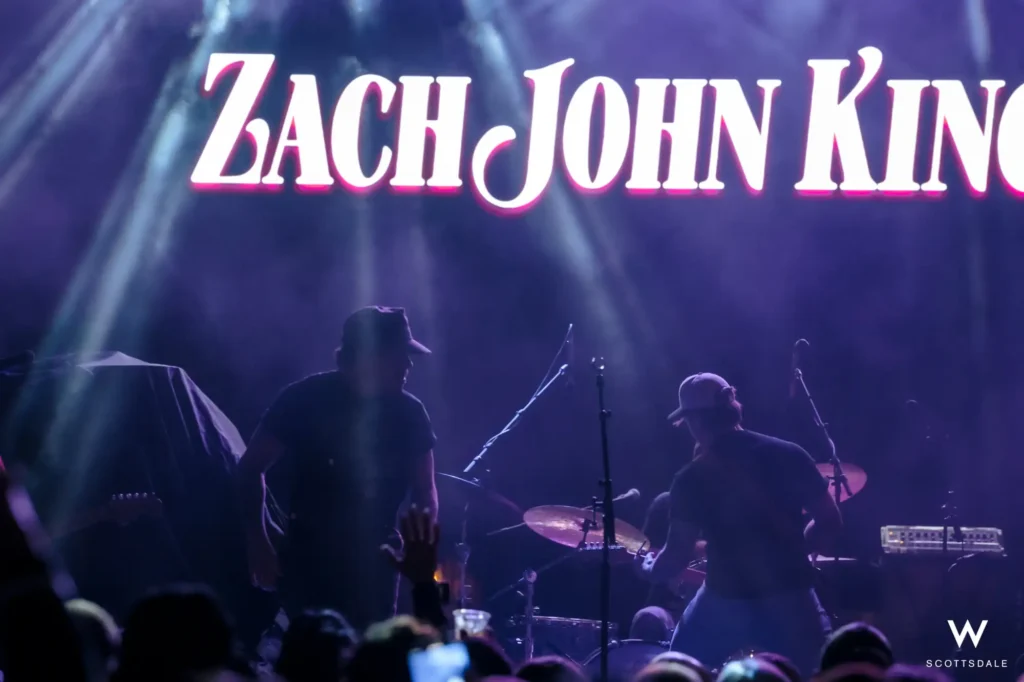 Rock the rooftop 2025 zach john king stage silhouette purple lights